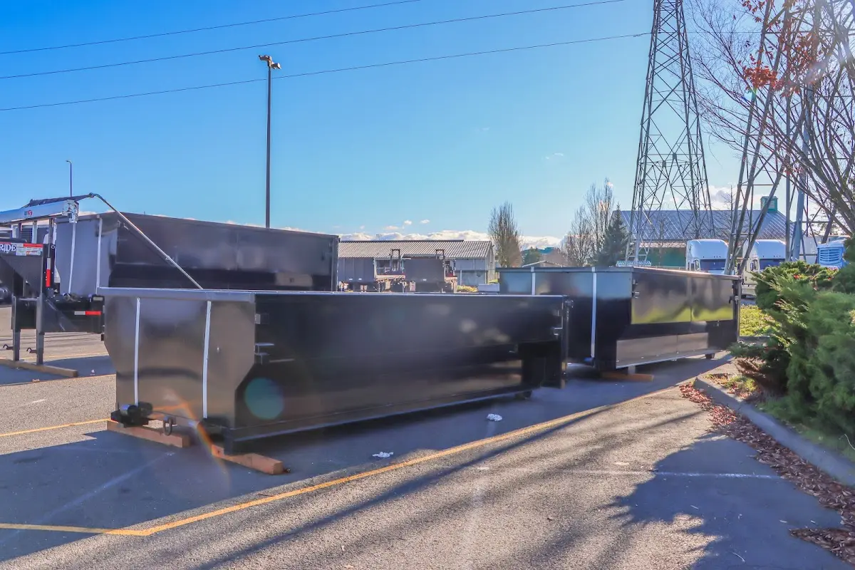 Roll-off dumpster ready for waste disposal at job site for 12 Yard Dumpster Rental in Boone